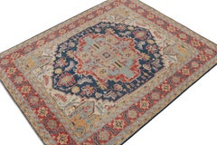 Rug & Kilim’s Serapi Style rug in Red, Blue & Gold with Medallion Pattern
