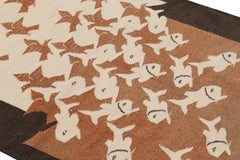 Rug & Kilim’s “Sky and Water II” M.C. Escher-Style Tapestry with Pictorials