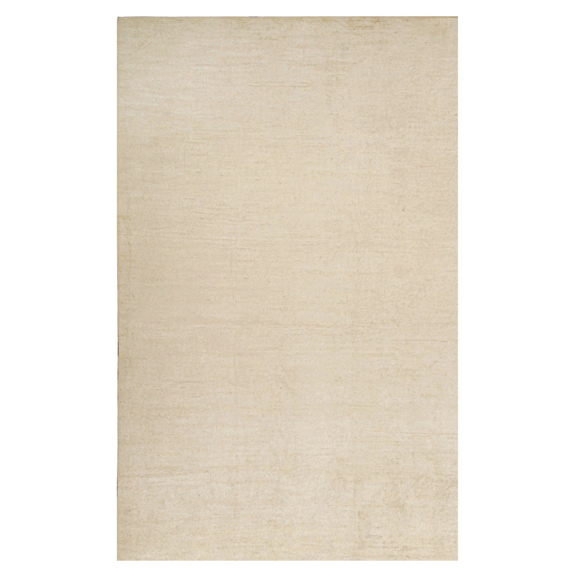 Rug & Kilim è un tappeto solido beige-marrone in stile contemporaneo tono su tono.