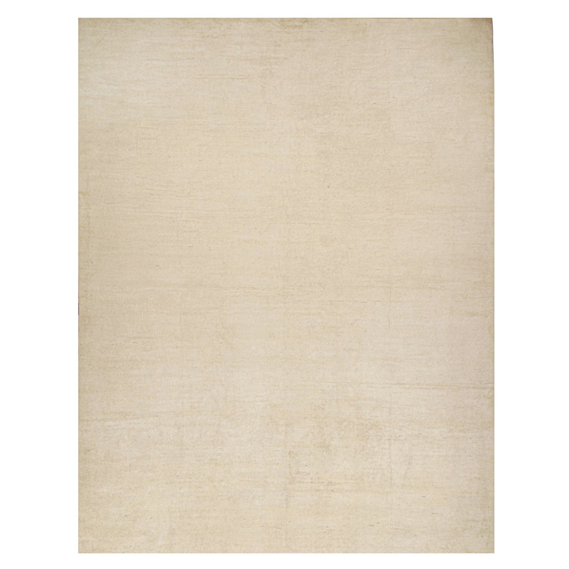 Rug & Kilim è un tappeto solido beige-marrone in stile contemporaneo tono su tono.