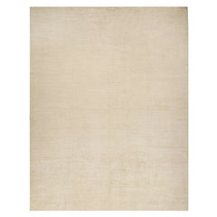 Rug & Kilim è un tappeto solido beige-marrone in stile contemporaneo tono su tono.