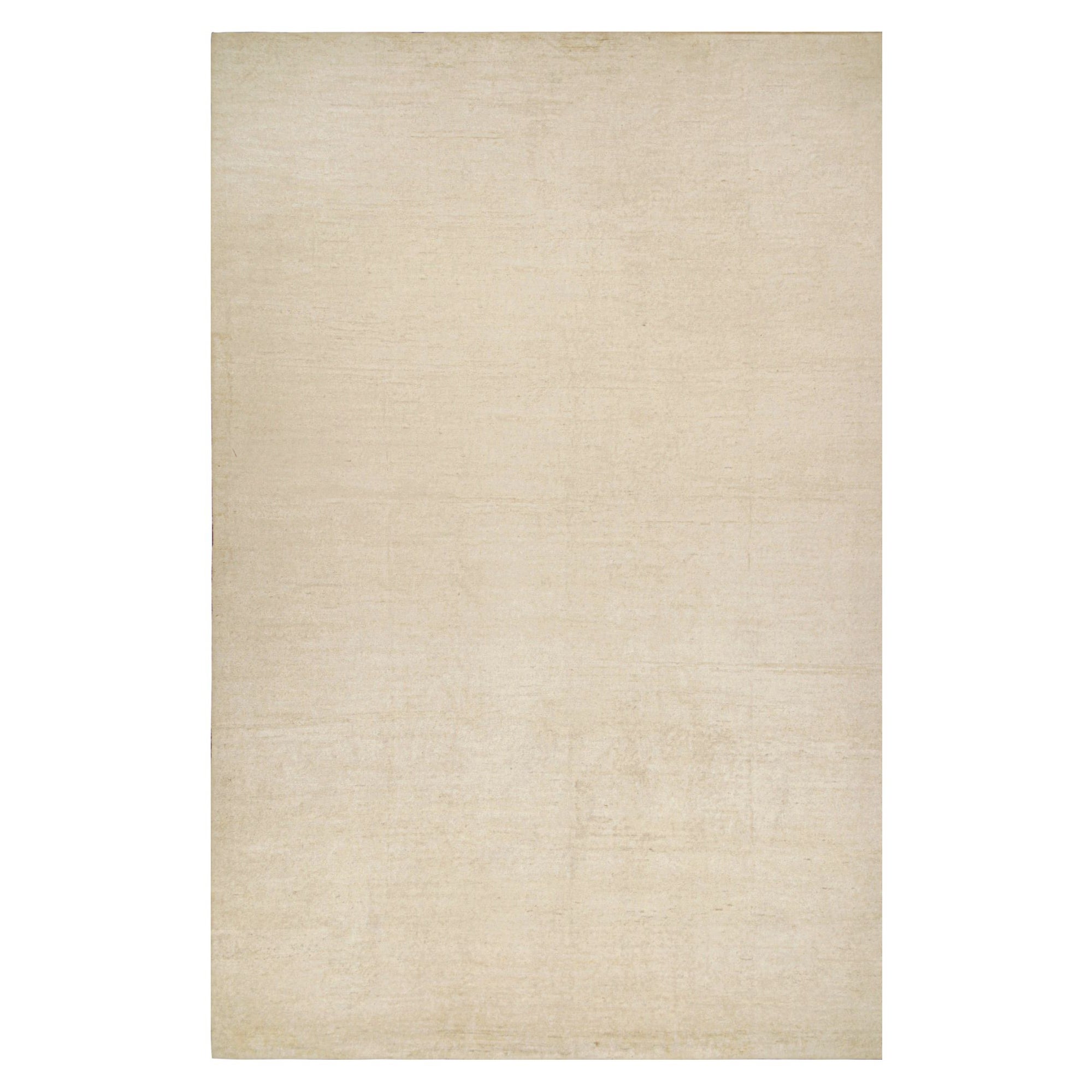 Rug & Kilim è un tappeto solido beige-marrone in stile contemporaneo tono su tono.