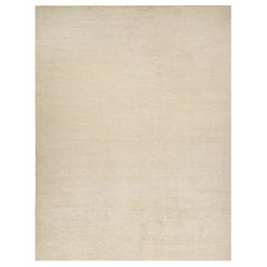 Rug & Kilim è un tappeto solido beige-marrone in stile contemporaneo tono su tono.