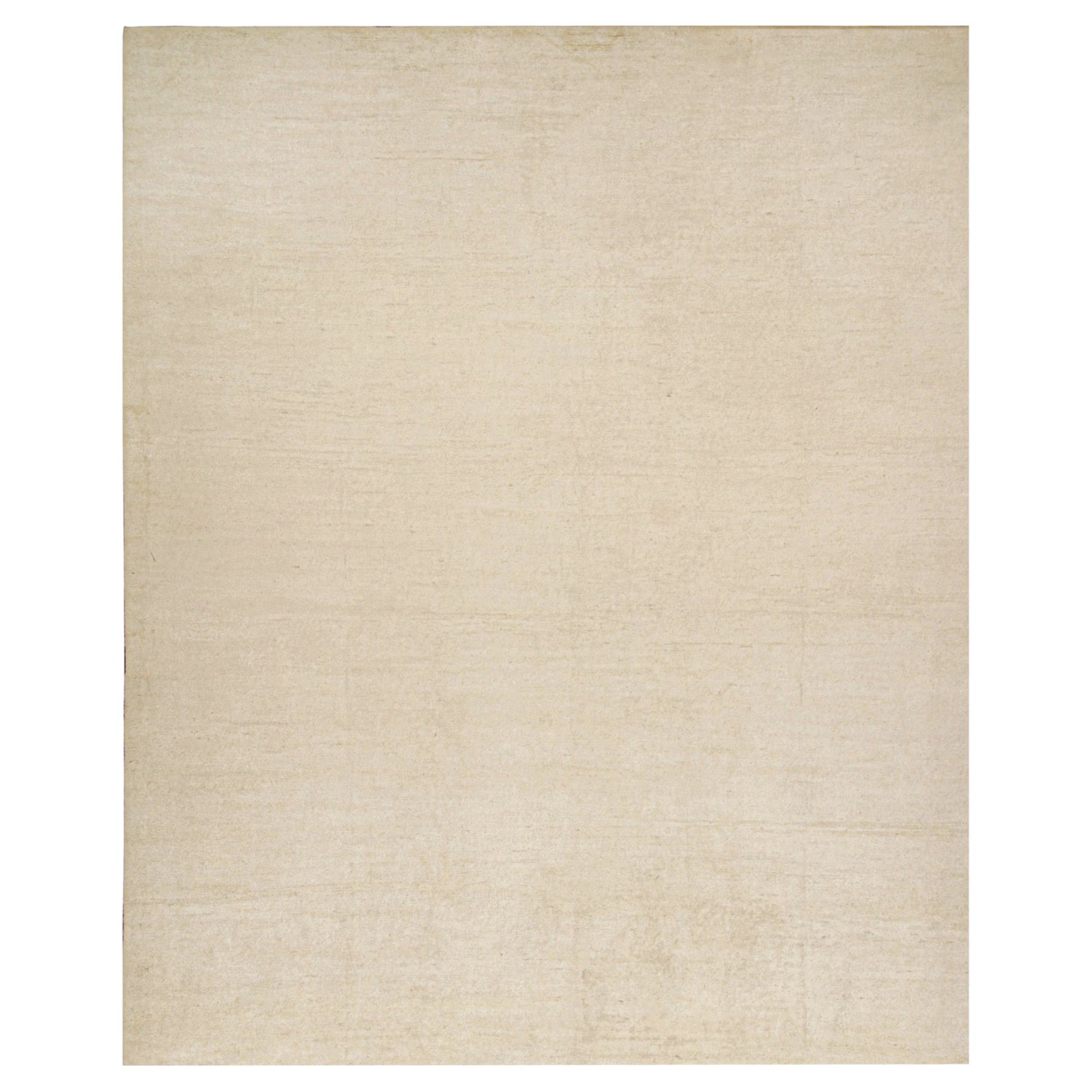 Rug & Kilim è un tappeto solido beige-marrone in stile contemporaneo tono su tono.