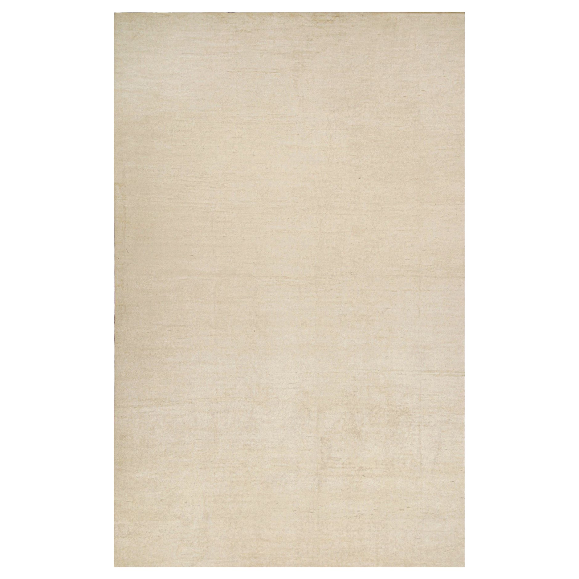 Rug & Kilim è un tappeto solido beige-marrone in stile contemporaneo tono su tono.