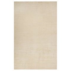 Rug & Kilim è un tappeto solido beige-marrone in stile contemporaneo tono su tono.