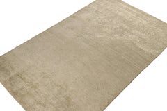 Rug & Kilim’s Solid Beige Rug in Tone-on-tone Hand-Knotted Silk Striae
