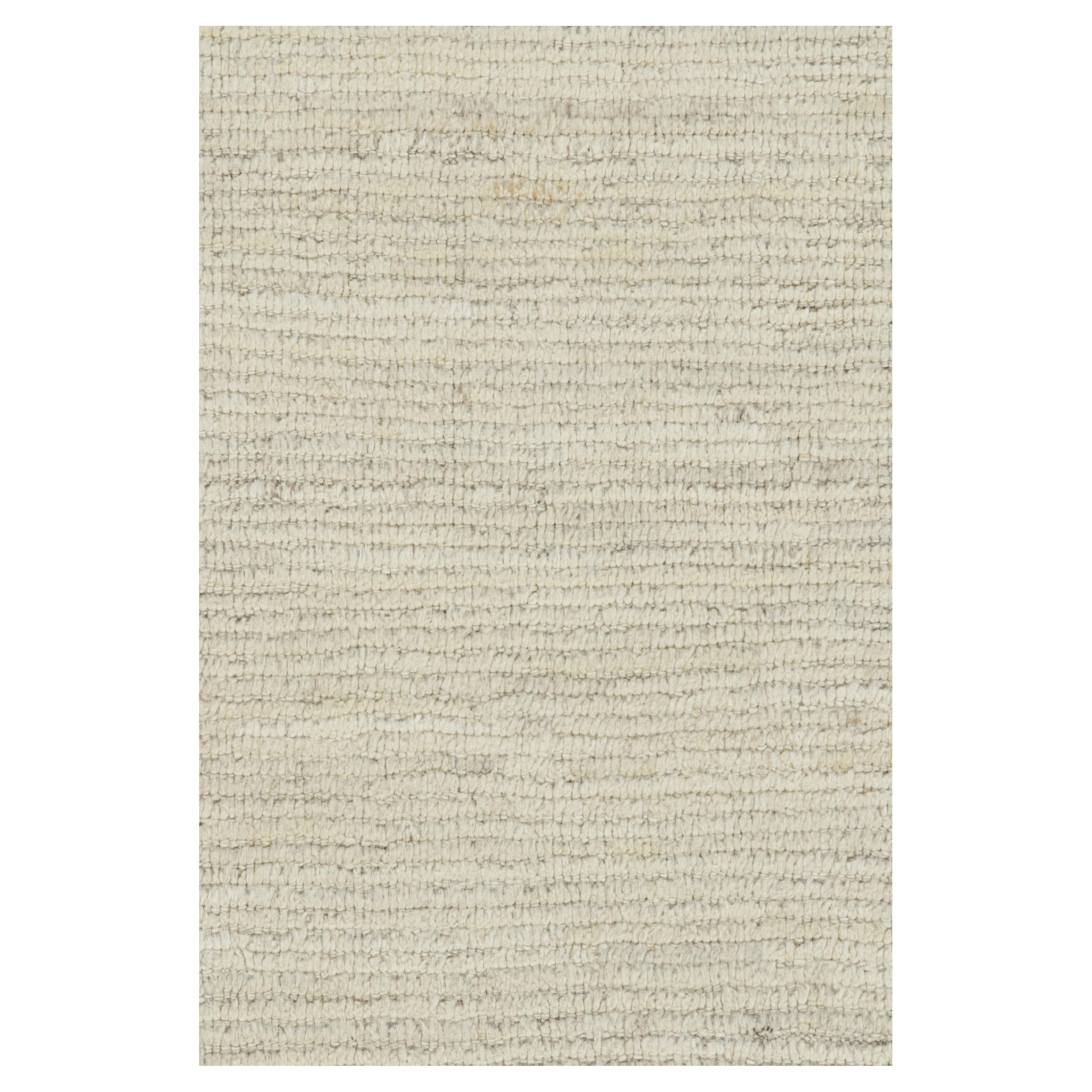 Dieser 9x12 große, unifarbene Teppich aus handgewebter Wolle ist eine spannende Ergänzung der Textural-Teppichkollektion von Rug & Kilim. Diese besondere Linie bietet Teppiche mit einem Spiel aus Flor und Flachgewebe, mit einem subtilen
