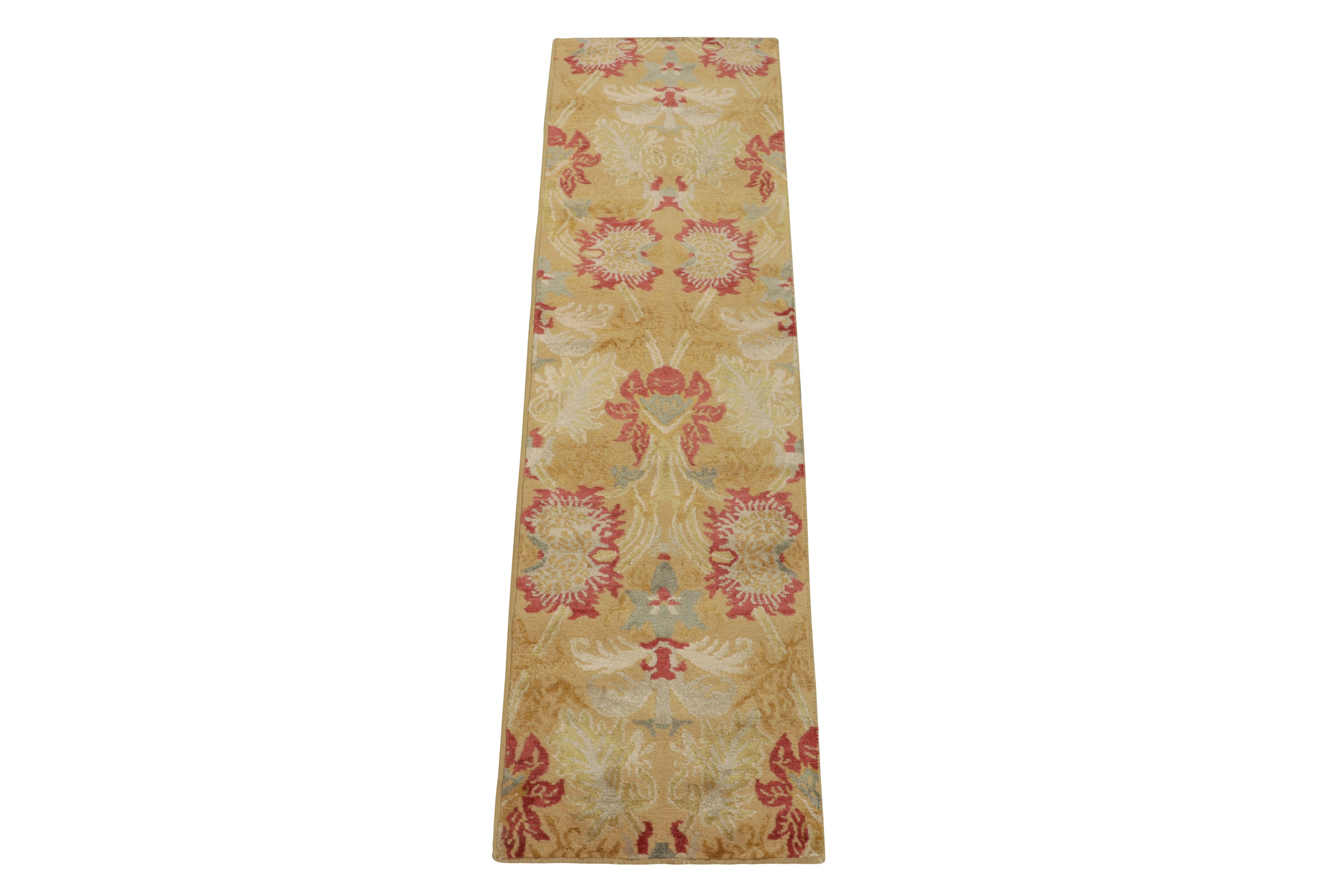 Hand-knotted in luxurious silk, a 2x6 contemporary runner from our European collection. The drawing carries our Toledo design inspired by Spanish antique floral rugs in an alluring play of gold, red & blue for a lustrous appeal. One of our most