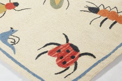 Rug & Kilim’s Suzani-Inspired Kilim, Playful Animal Pictorials over Cream White