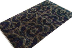 Rug & Kilim’s Tabriz Style Rug in Blue with Green and Brown Ikats Patterns