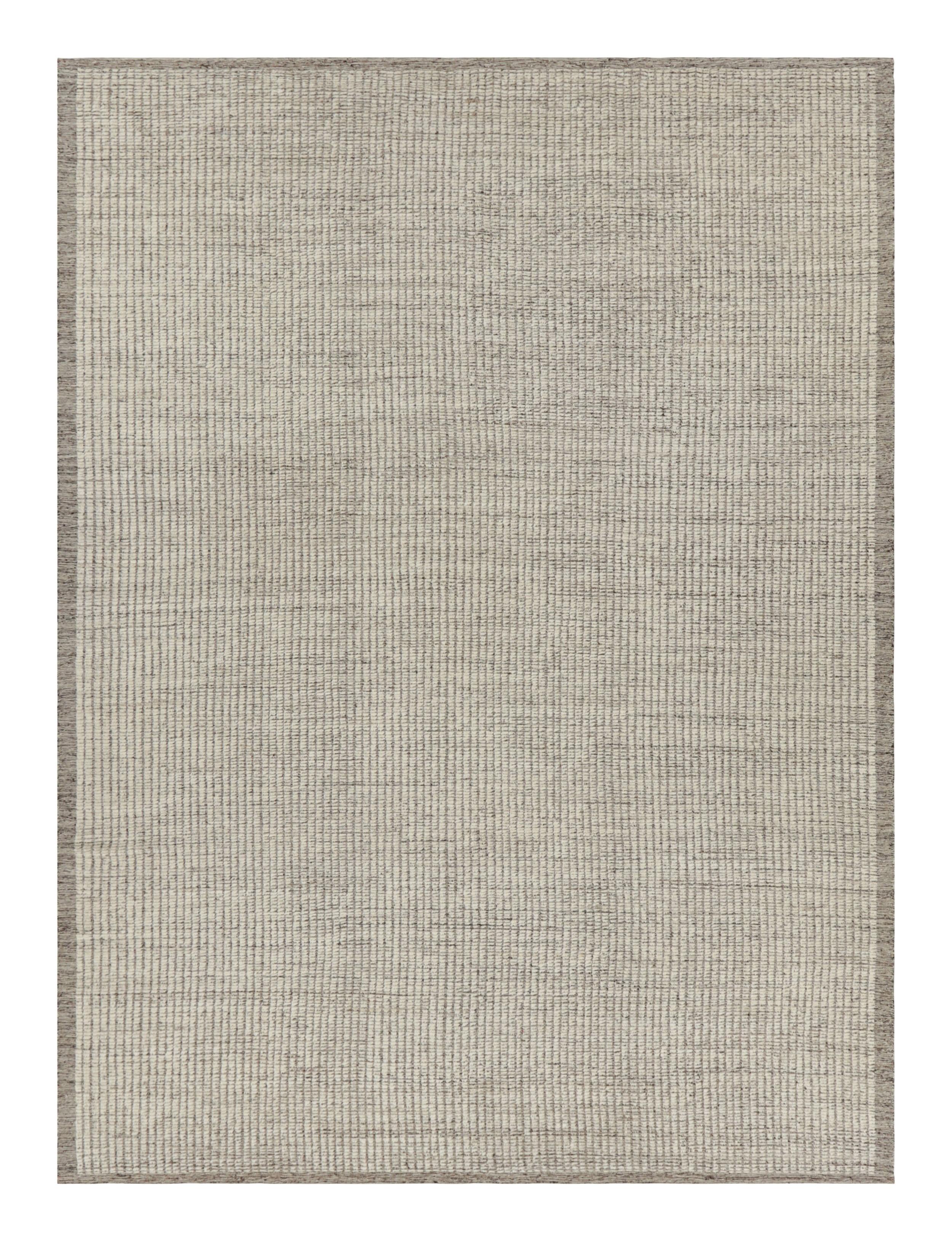 Handwoven in wool, this 9x12 contemporary Kilim is an exciting addition to both the Kilim & Flat Weave and Textural rug collections by Rug & Kilim. This particular line features rugs with a play of both pile and flatweave together, with a subtle