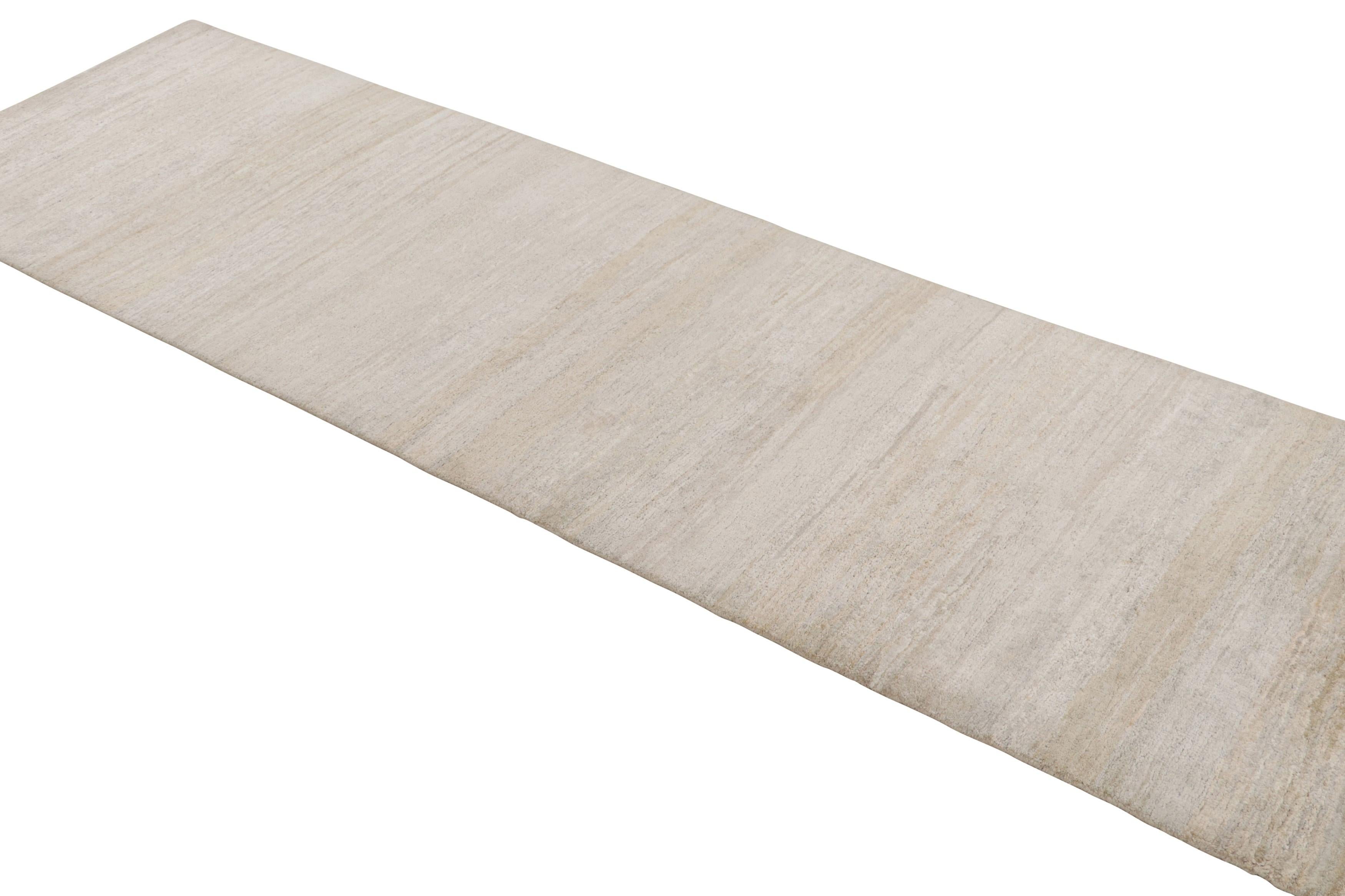A hand-knotted 3 x 10 wool and silk runner joining Rug & Kilim’s Texture of Color Collection. Enjoying textural, subtly high-low pile and a unique take on two-tone plain rug styles in forgiving beige hues. Modern and approachable, lending subdued