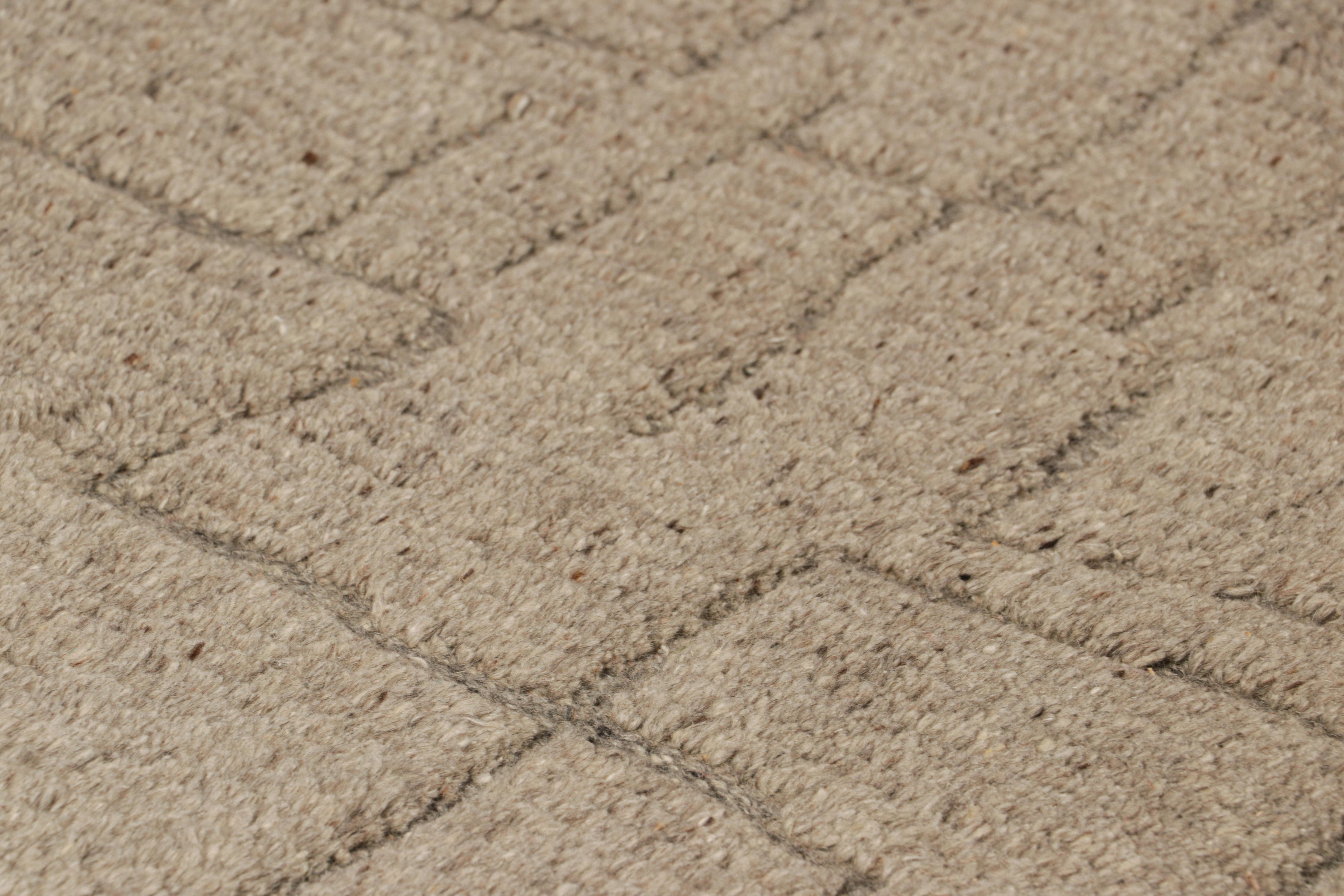 Dieser handgeknüpfte Wollteppich im Format 2x3 aus unserer Kollektion in Geschenkgröße zeichnet sich durch einen üppigen Hochflor mit geometrischen Mustern in einer Hoch-Tief-Struktur aus - ein geschmackvoller und verspielter Ansatz für Dimensionen.