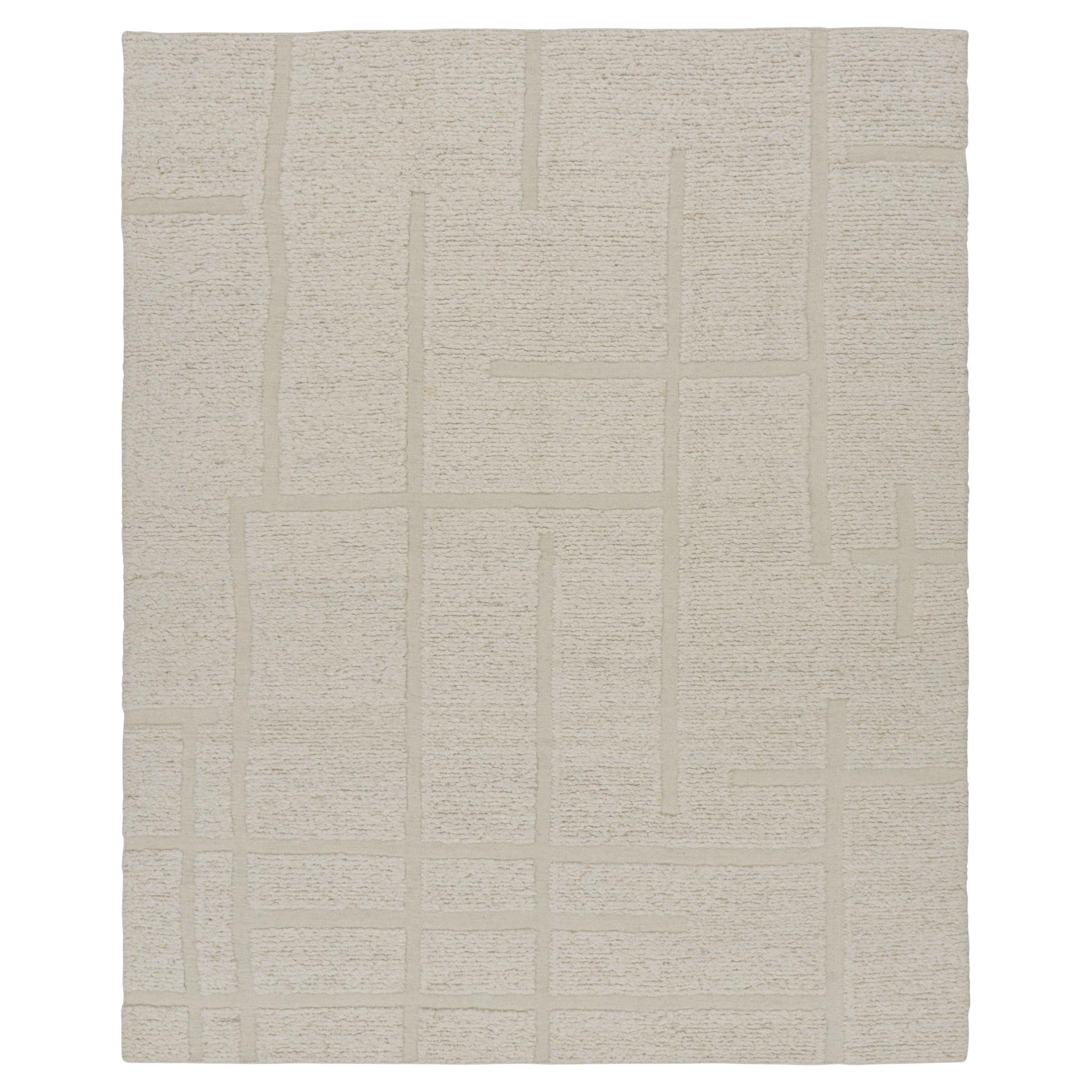 Rug & Kilim's Strukturteppich in Cremeweiß mit geometrischen Hoch-Tief-Mustern
