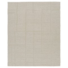 Rug & Kilim's Strukturteppich in Cremeweiß mit geometrischen Hoch-Tief-Mustern