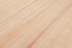 Rug & Kilim’s Textural Rug in Peach Tones and Striae