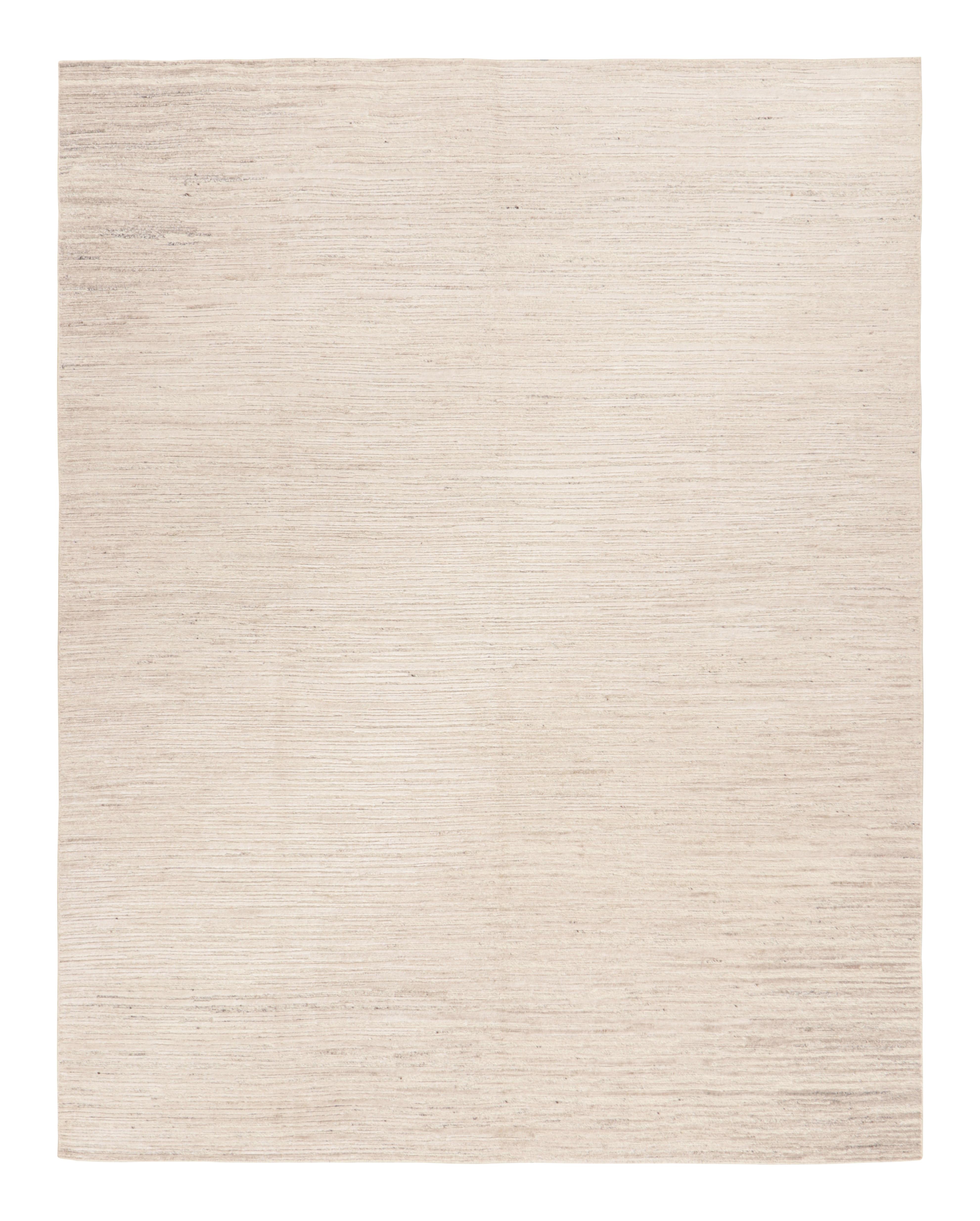 Handwoven in wool, this 8x10 rug represents an exciting new design in the Textural rug collection by Rug & Kilim. 

On the Design: 

Cream white and beige tones underscore a subtle play of high-low texture, married to abstract stripes in a take on