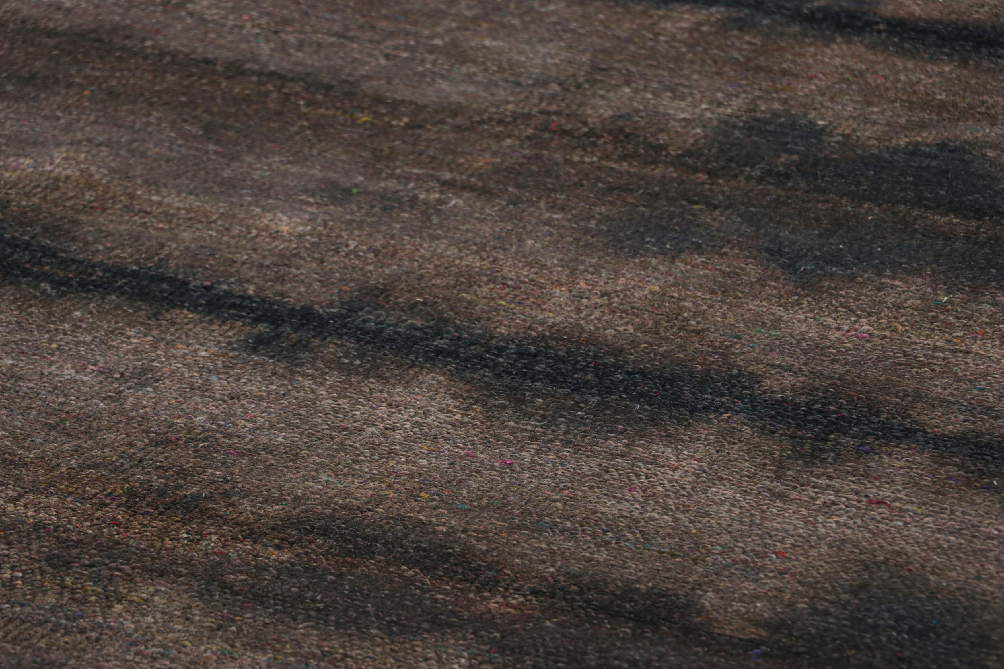 Hand-knotted in silk, this 8x11 rug is a rich new addition to Rug & Kilim’s Textural rug collection—with an impressive range of colors and attention to movement in its unique play on stripes, striae, and subtle geometric patterns.

On the Design: