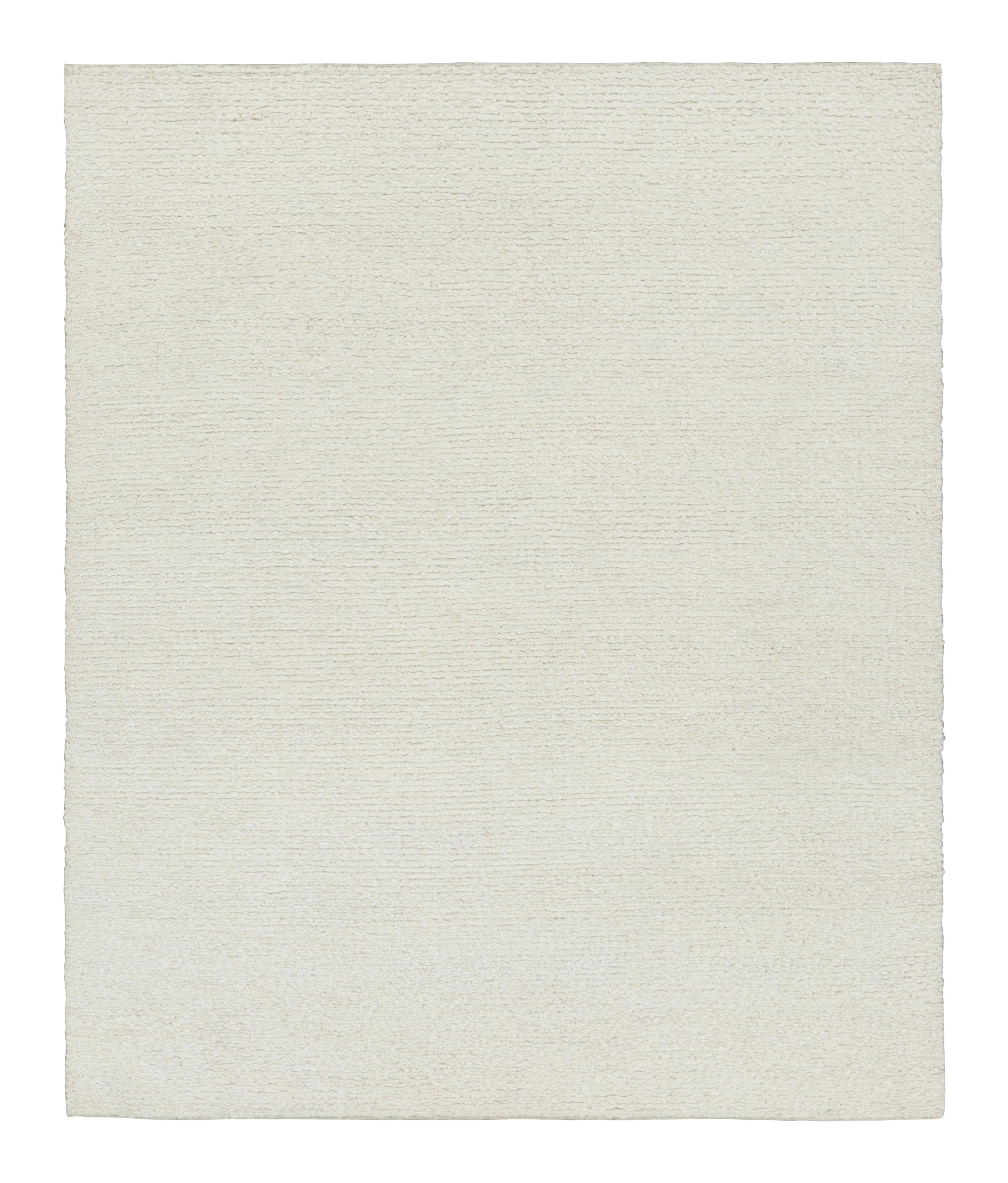 This hand-knotted wool 8x10 rug represents an exciting new bouclet-like texture Rug & Kilim’s Textural rug collection. 

On the Design: 

A bright creamy white underscores a soft, yet refined pile texture—a more intricate, yet still comfortable take