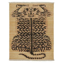 Rug & Kilim’s Tiger Rug in Gold with Orange and Black Pictorial