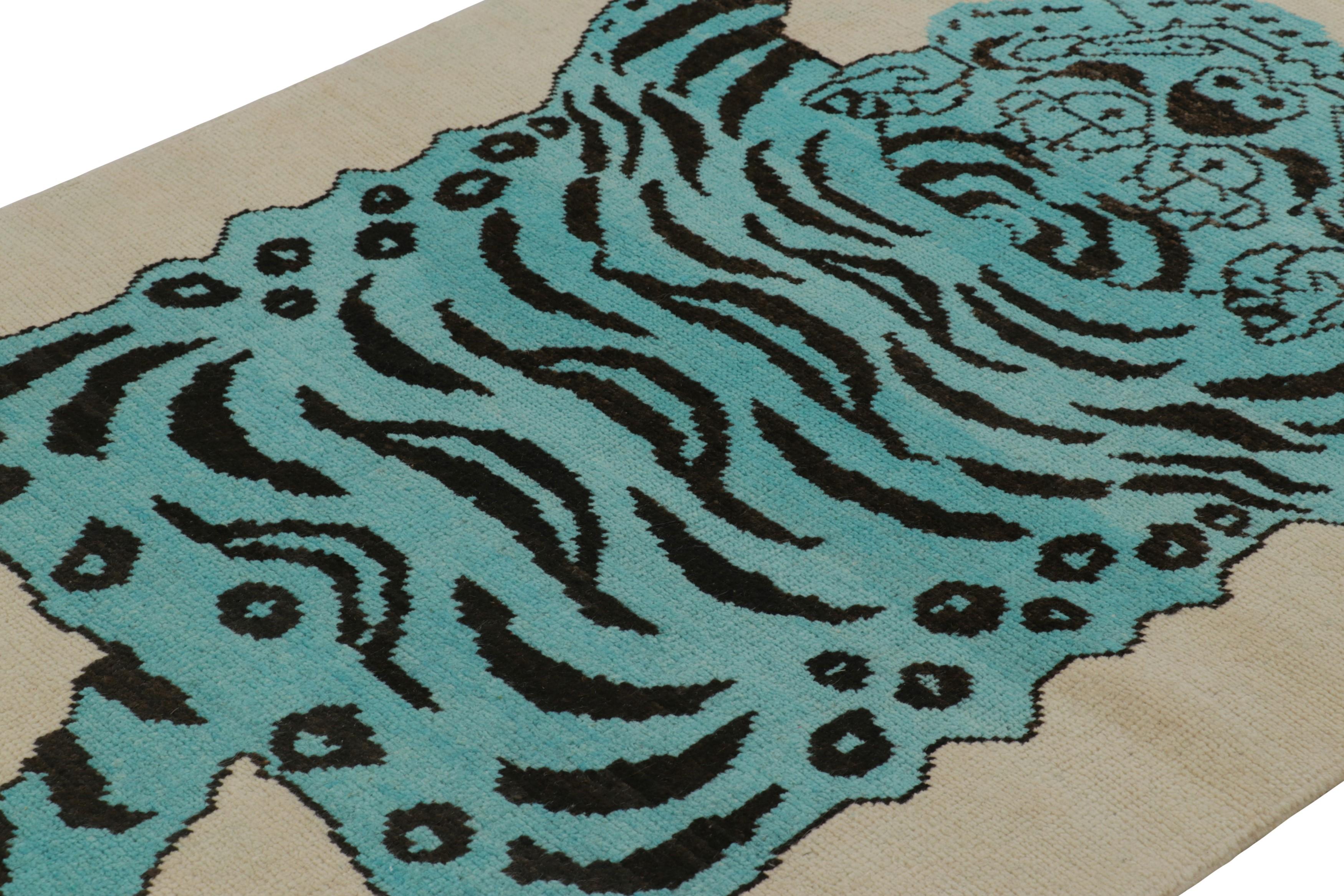 Hand-knotted in wool, this 4x6 modern tiger skin rug originating from Turkey, is a bold addition to the Rug & Kilim Tiger rugs line of their Modern Classics Collection. 

On the Design: 

This pictorial representation of an animal pelt pattern