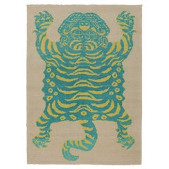 Rug & Kilim’s Tiger Skin Rug in Beige with Blue and Yellow Pictorial