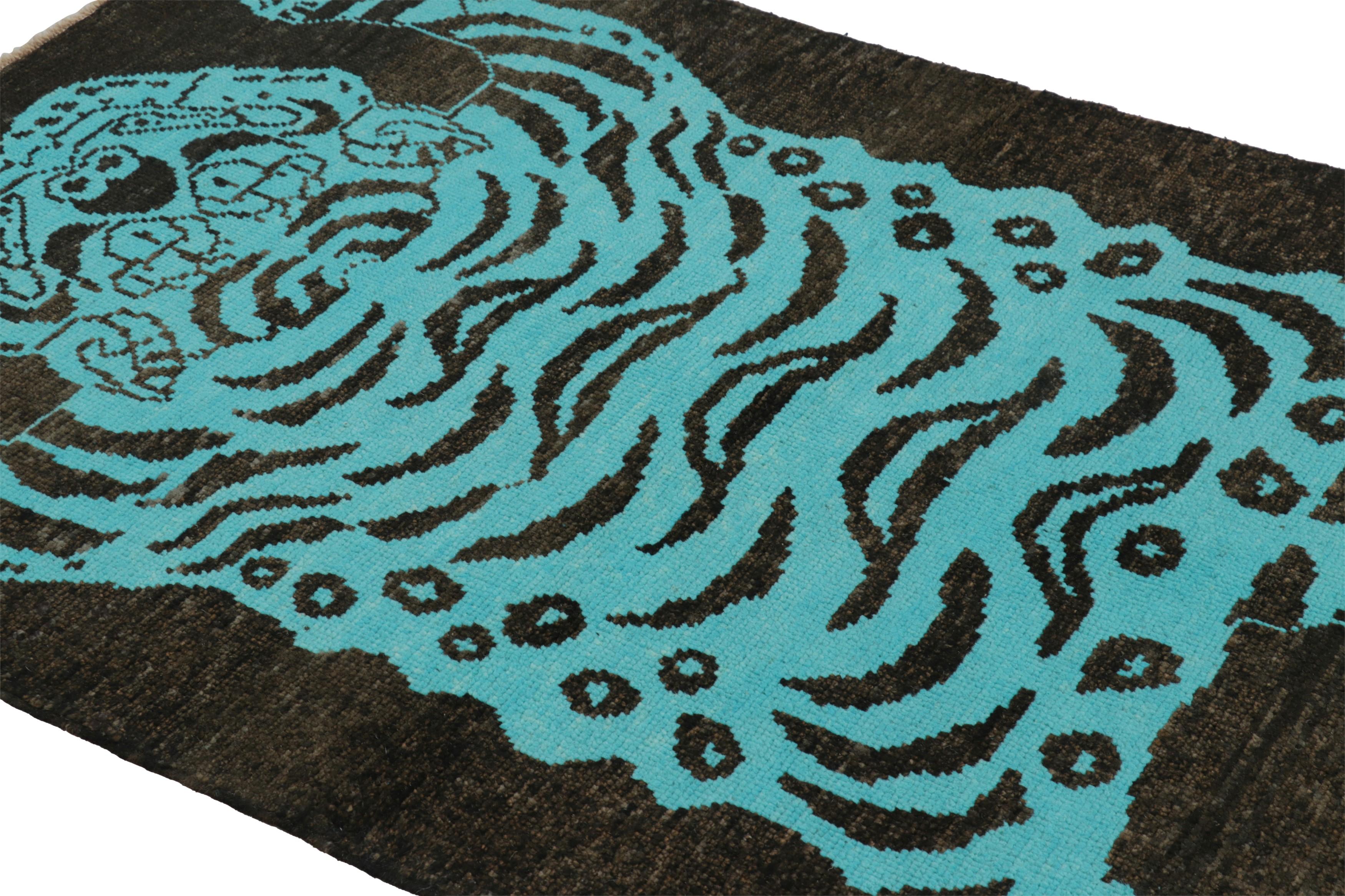 Hand-knotted in wool, this 4x7 modern tiger skin rug originating from Turkey, is a bold addition to the Rug & Kilim Tiger rugs line of their Modern Classics Collection. 

On the Design: 

This pictorial representation of an animal pelt pattern
