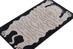 Rug & Kilim’s Tiger-Skin Rug in Black with Cream & Brown Pictorial