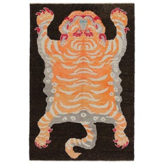 Rug & Kilim’s Tiger Skin Rug in Black with Rust, Gray and Red Pictorial