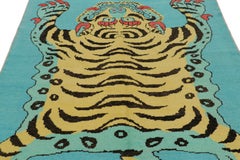Rug & Kilim’s Tiger Skin Rug in Blue with Gold, Red and Black Pictorial