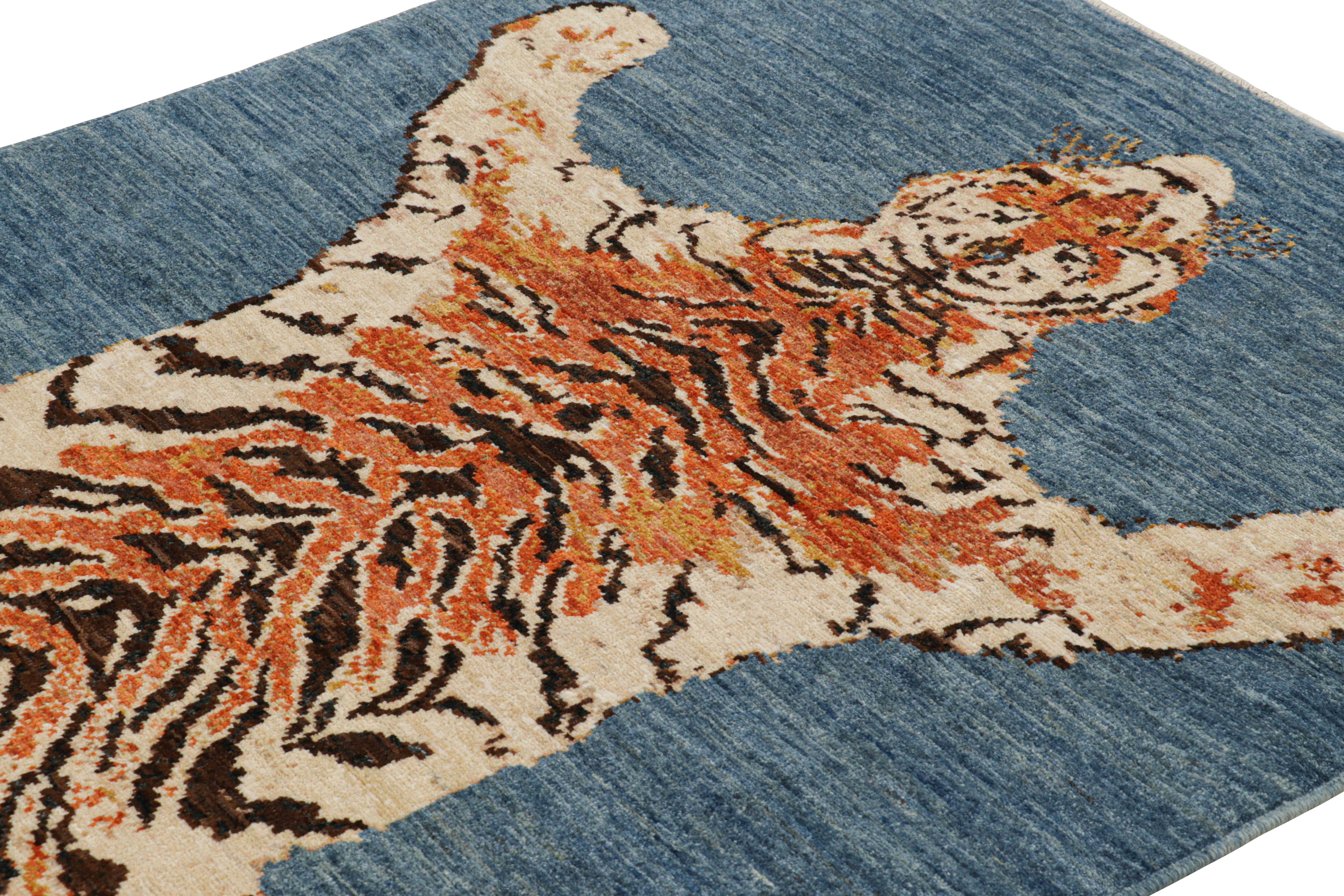 Noué à la main en laine, ce tapis moderne en peau de tigre 4x6 est un ajout audacieux à la ligne de tapis Rug & Kilim Tiger de leur Collection Modern Classics. 

Sur le Design : 

Cette représentation picturale d'un motif de peau d'animal présente