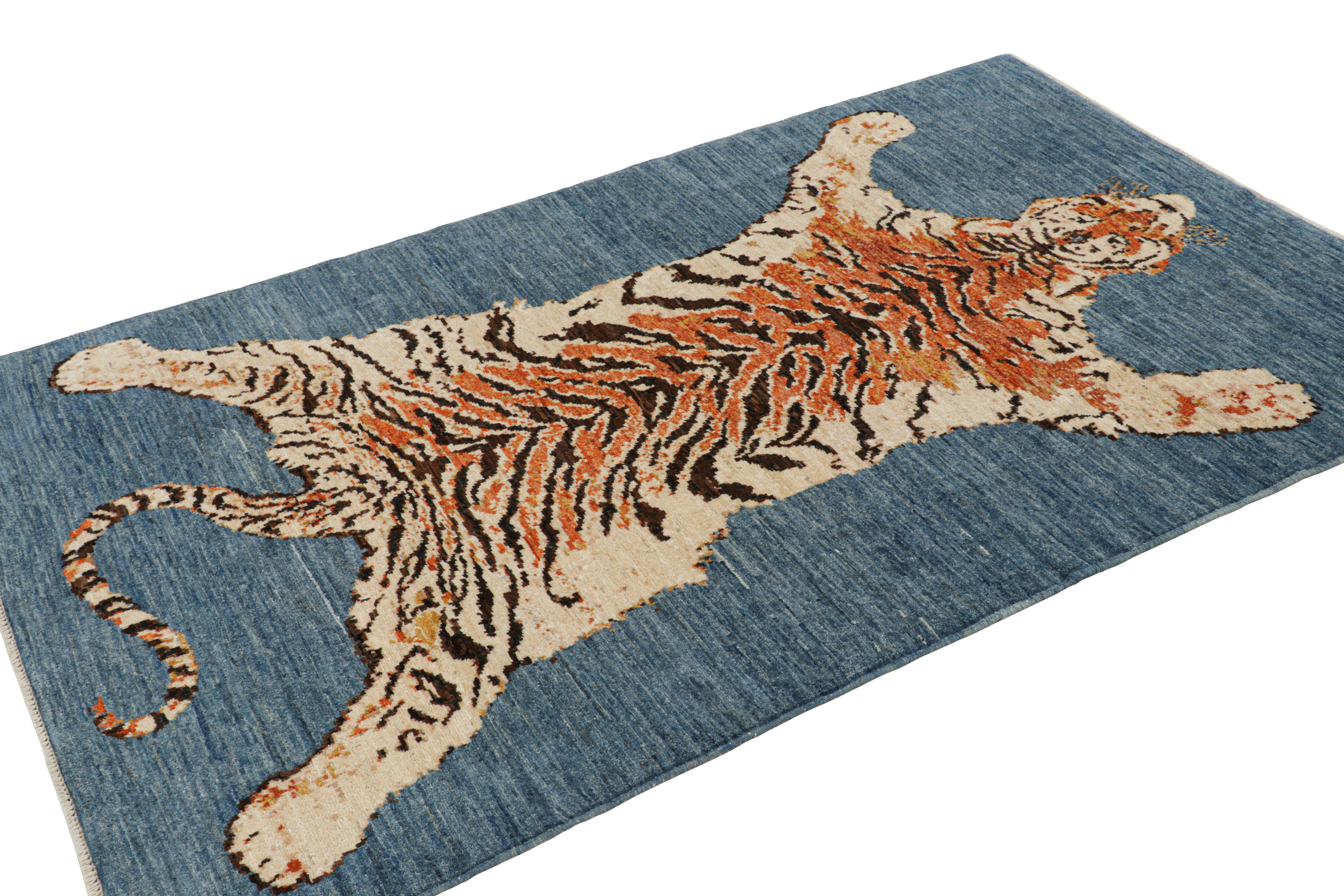 Afghan Rug & Kilim's Tiger Skin Rug in Blue with Orange and Beige-Brown Pictorial (tapis en peau de tigre bleu avec orange et beige-brun) en vente