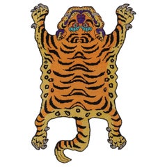 Rug & Kilim’s Tiger Skin Rug in Rust with Black and Gold Pictorial