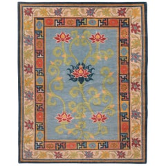 Rug & Kilim's traditioneller blauer und gold-beiger nepalesischer Wollteppich mit Tradition