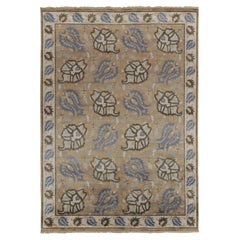 Rug & Kilim: tappeto di transizione con motivi floreali beige-marrone e blu
