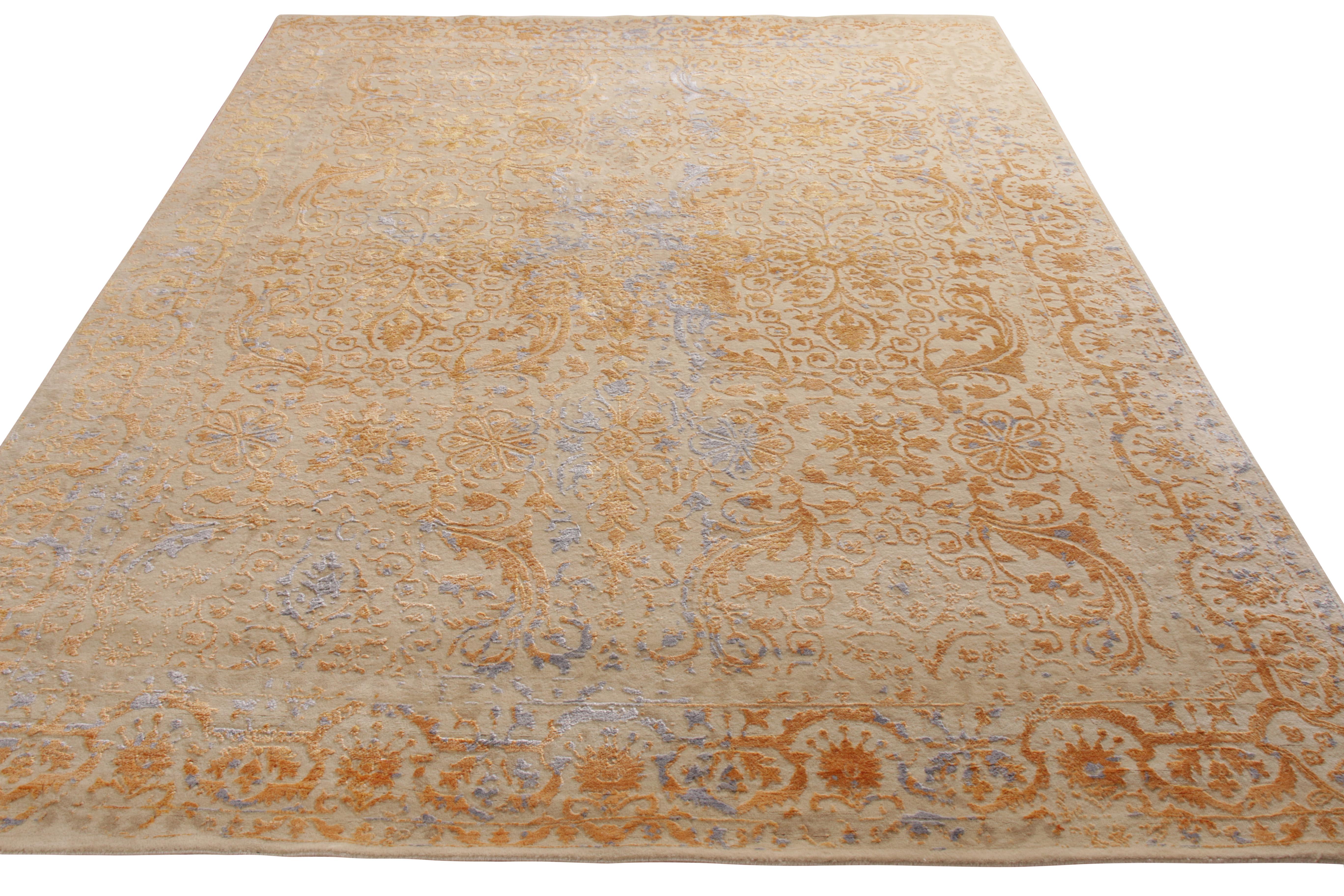 An 8x10 contemporary ode to transitional rug styles, from the Modern Classics Collection by Rug & Kilim. Hand knotted in wool and all-natural silk, enjoying regal gold and silver atop beige in a textural high-low floral pattern. Especially unique in