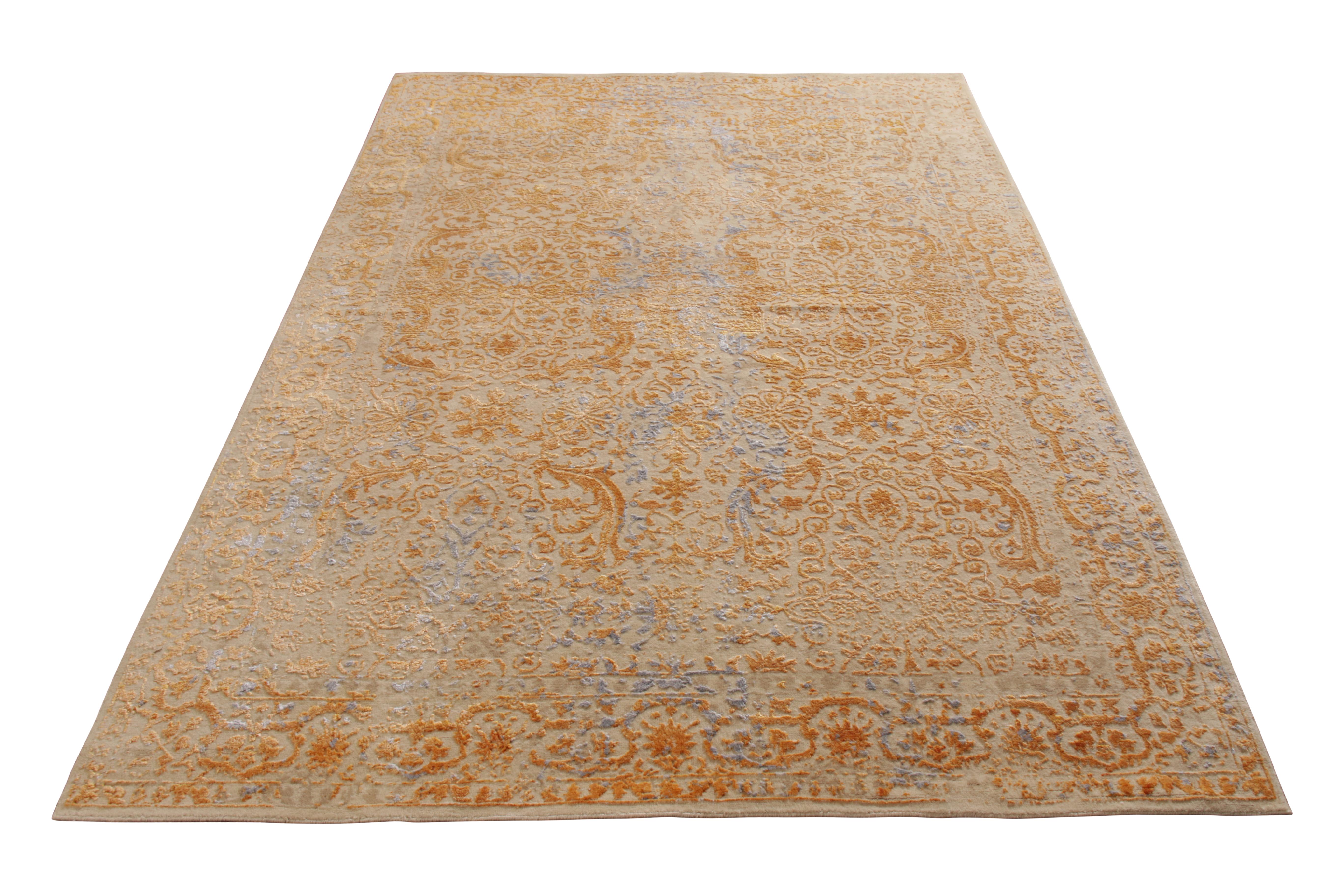 A 6x9 contemporary ode to transitional rug styles, from the Modern Classics Collection by Rug & Kilim. Hand knotted in wool and all-natural silk, enjoying regal gold and silver atop beige in a textural high-low floral pattern. Especially unique in