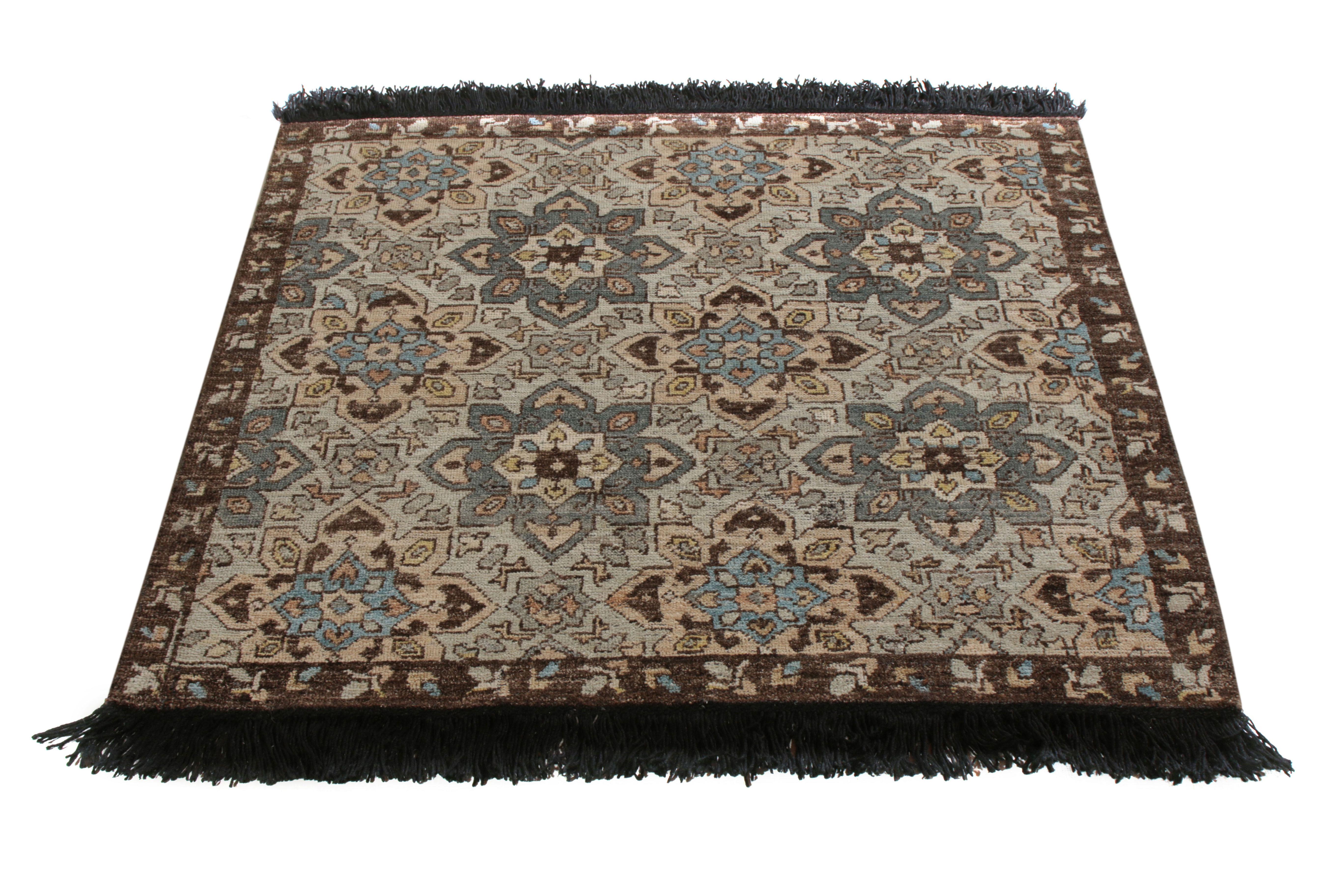 A 4 x 4 square rug inspired from celebrated transitional rug styles, from the Burano Collection by Rug & Kilim. Hand knotted in notably soft Ghazni wool, enjoying a warm-and-cool play of beige-brown and blue hues sitting peacefully underfoot.