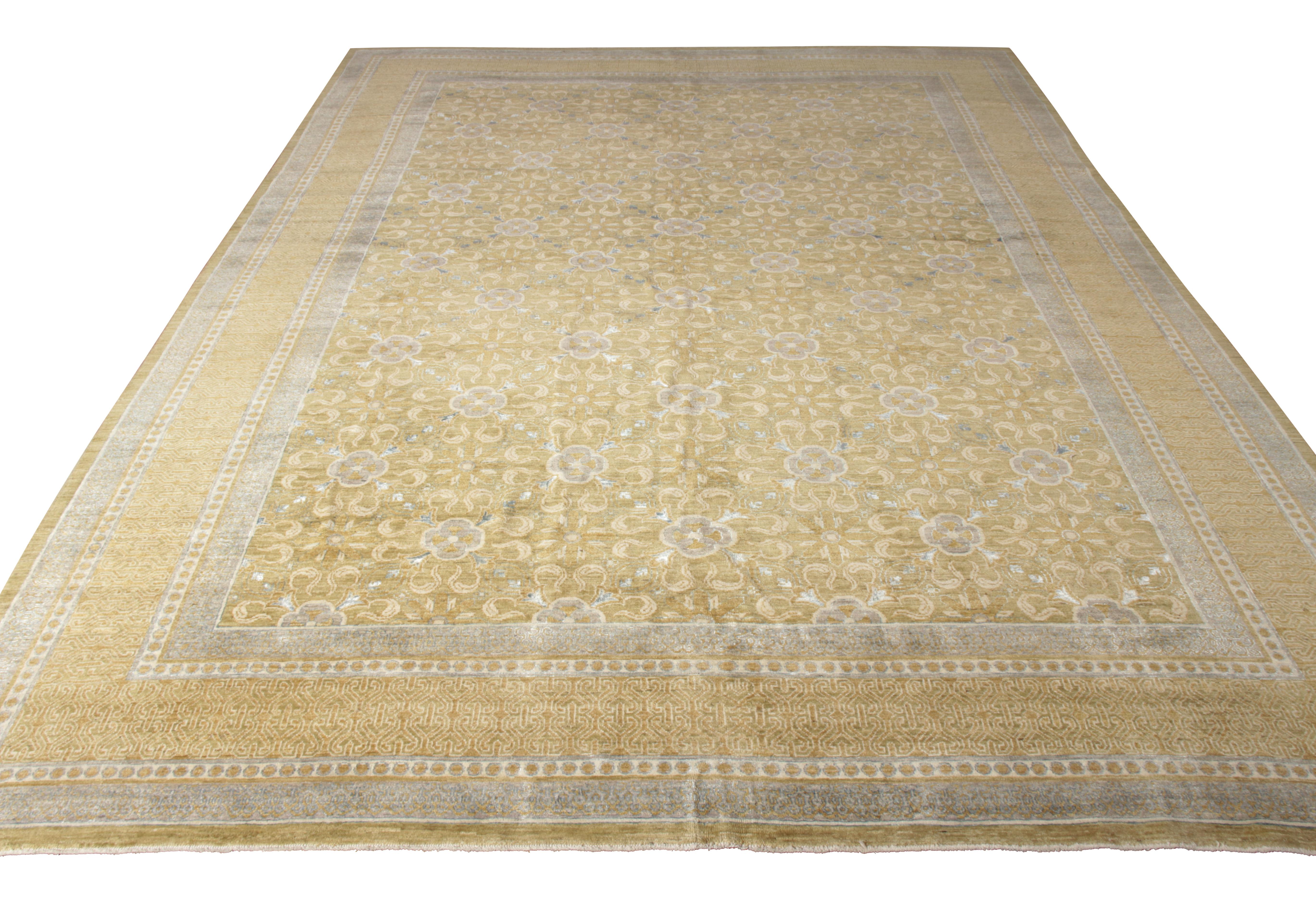 Diese 9x12 große Zeichnung aus der Modern Classics Collection'S von Rug & Kilim vereint die Ästhetik des Übergangs und der Moderne in einem ausdrucksstarken floralen Muster, das durch Bordüren in abwechselnden Farben von Hellblau und goldenem