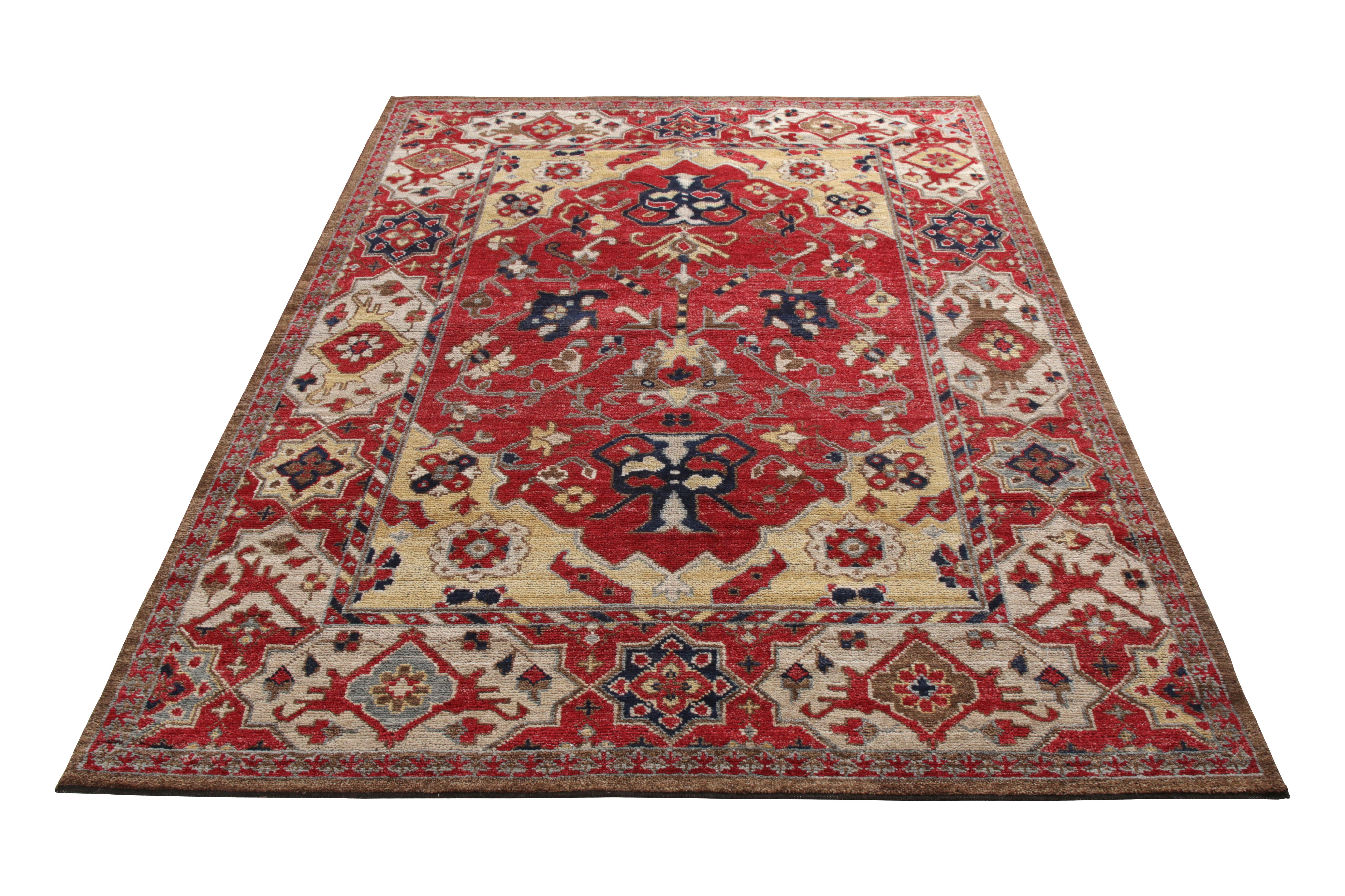 A 6x8 ode to celebrated transitional rug styles in hand-knotted wool, from Rug & Kilim’s Burano Collection. 
Rich red complemented by beige-brown and blue accents throughout a sophisticated, classic array of geometric-floral motifs in beautiful