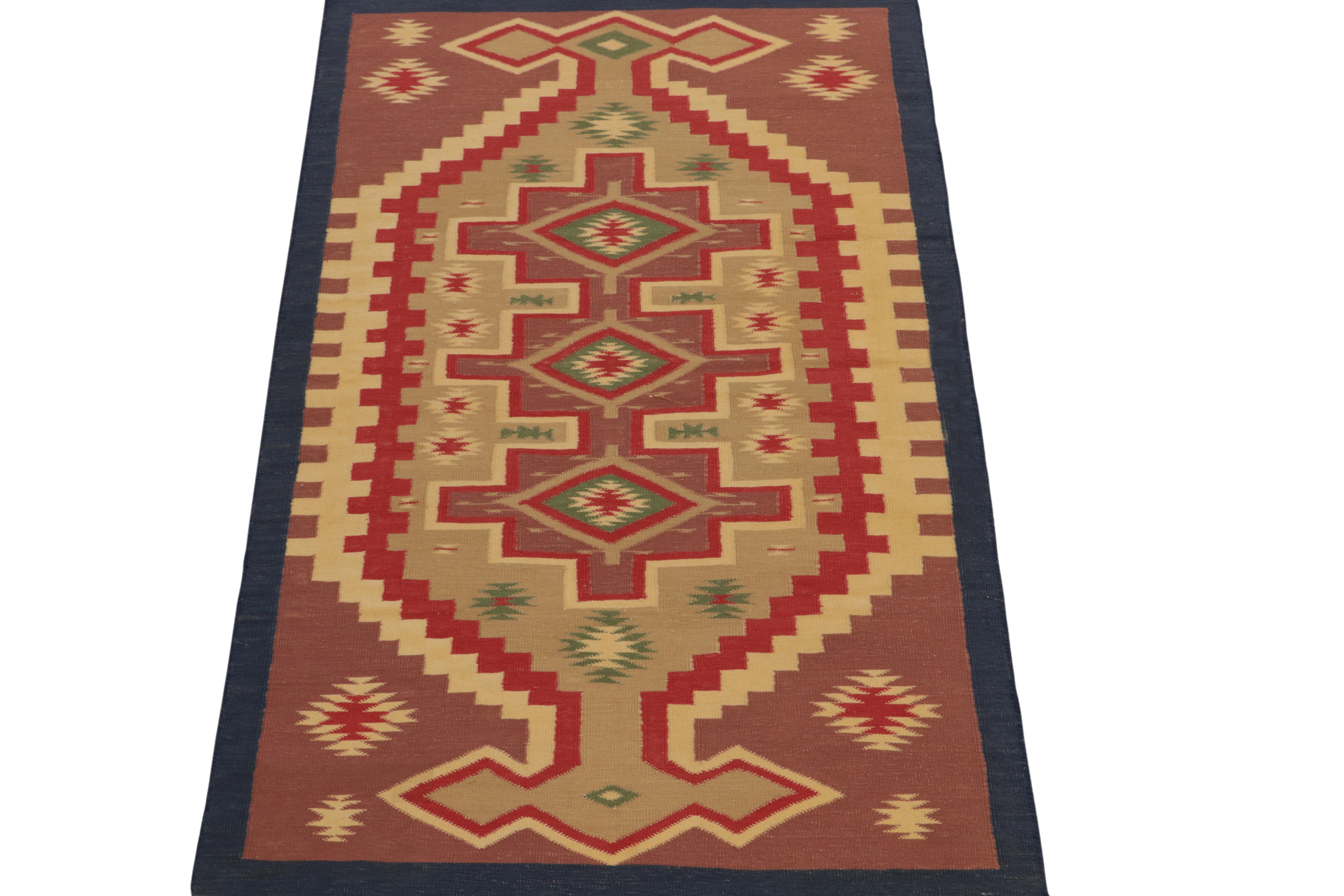 Indian Rug & Kilim’s Tribal Dhurrie Style rug in Pink, Red and Beige Geometric Pattern