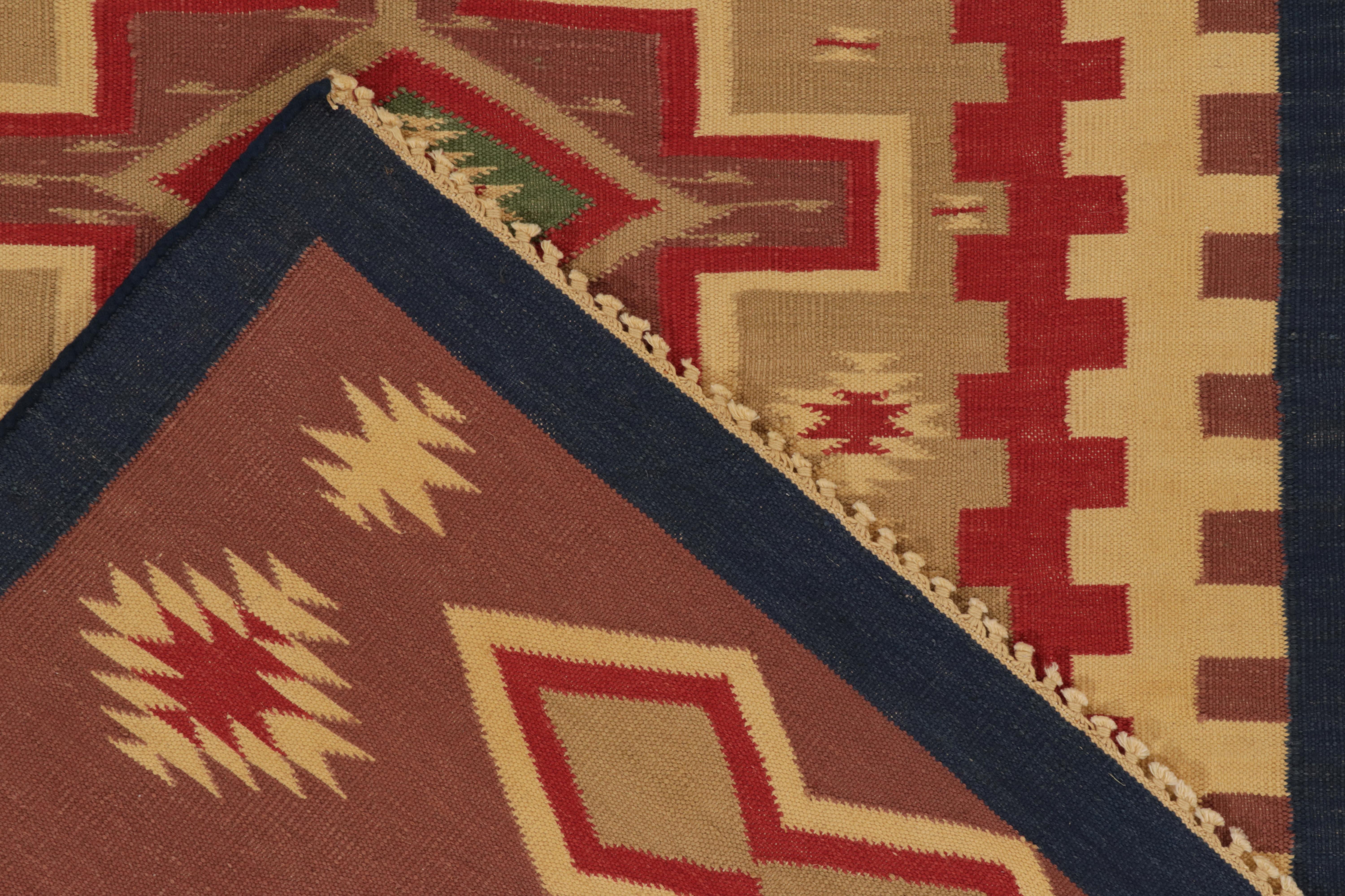 Wool Rug & Kilim’s Tribal Dhurrie Style rug in Pink, Red and Beige Geometric Pattern