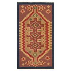 Rug & Kilim’s Tribal Dhurrie Style rug in Pink, Red and Beige Geometric Pattern