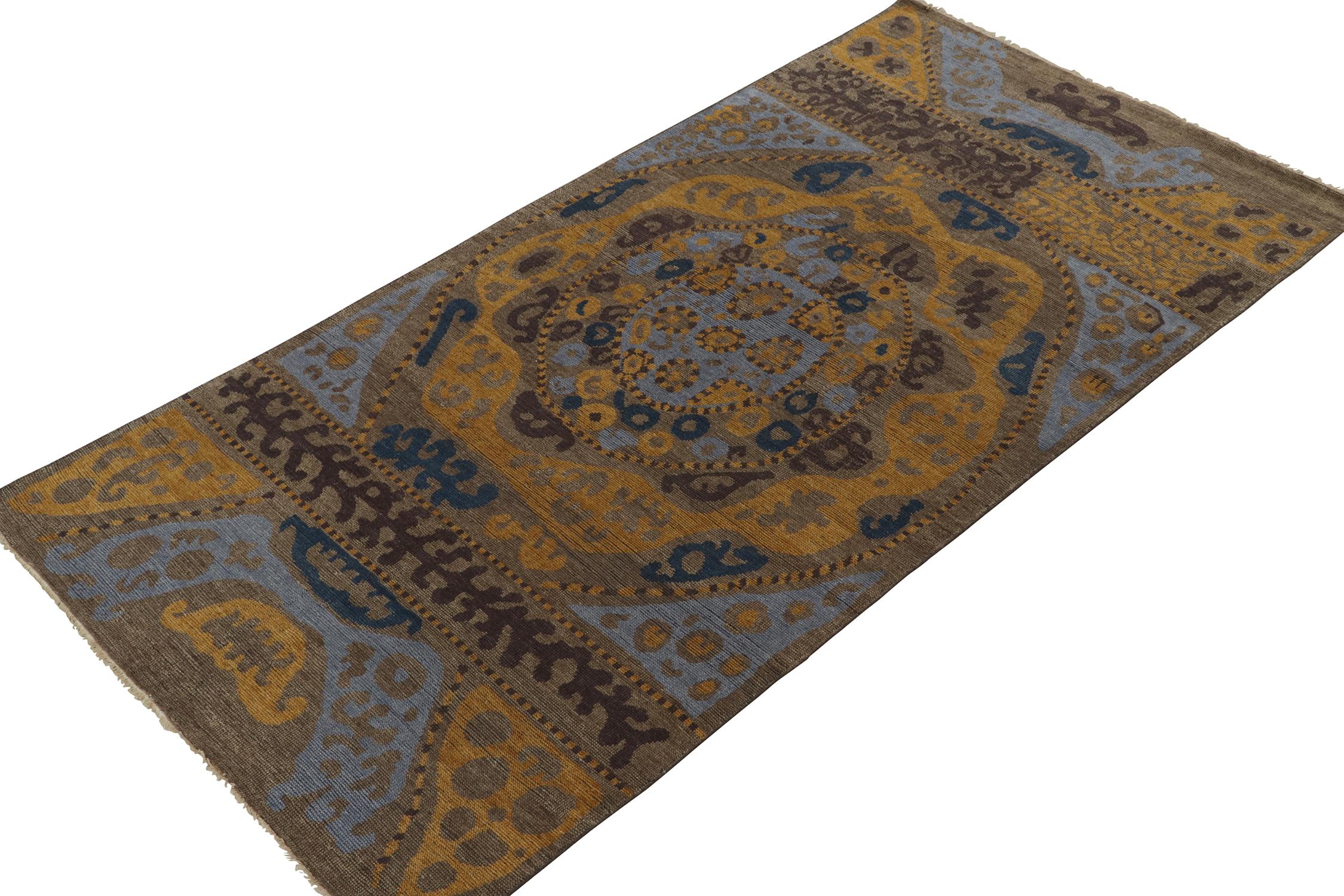 This 5x10 rug is a grand new entry to Rug & Kilim’s custom classics Burano collection. Hand-knotted in Persian wool.
Further on the Design: 
This piece draws on tribal textiles, and revels in rich brown with funky golds and blues of playful, yet