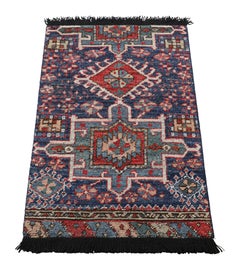 Rug & Kilim’s Tribal Rug in Blue and Red with Primitivist Geometric Patterns