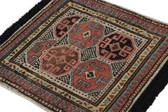 Rug & Kilim’s Tribal Square Rug with Primitivist Geometric Pattern and Medallion