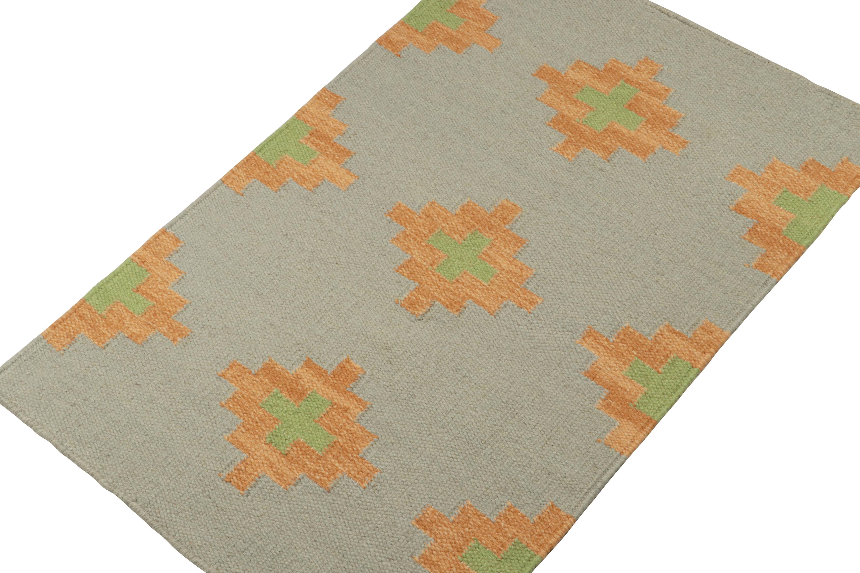 Inspired by tribal kilims, this 2x3 piece is an elegant new addition to the flatweave collection by Rug & Kilim.  

On the Design: 

Handwoven in wool, this contemporary kilim carries gold & green geometric patterns on grey. Further enjoying a smart