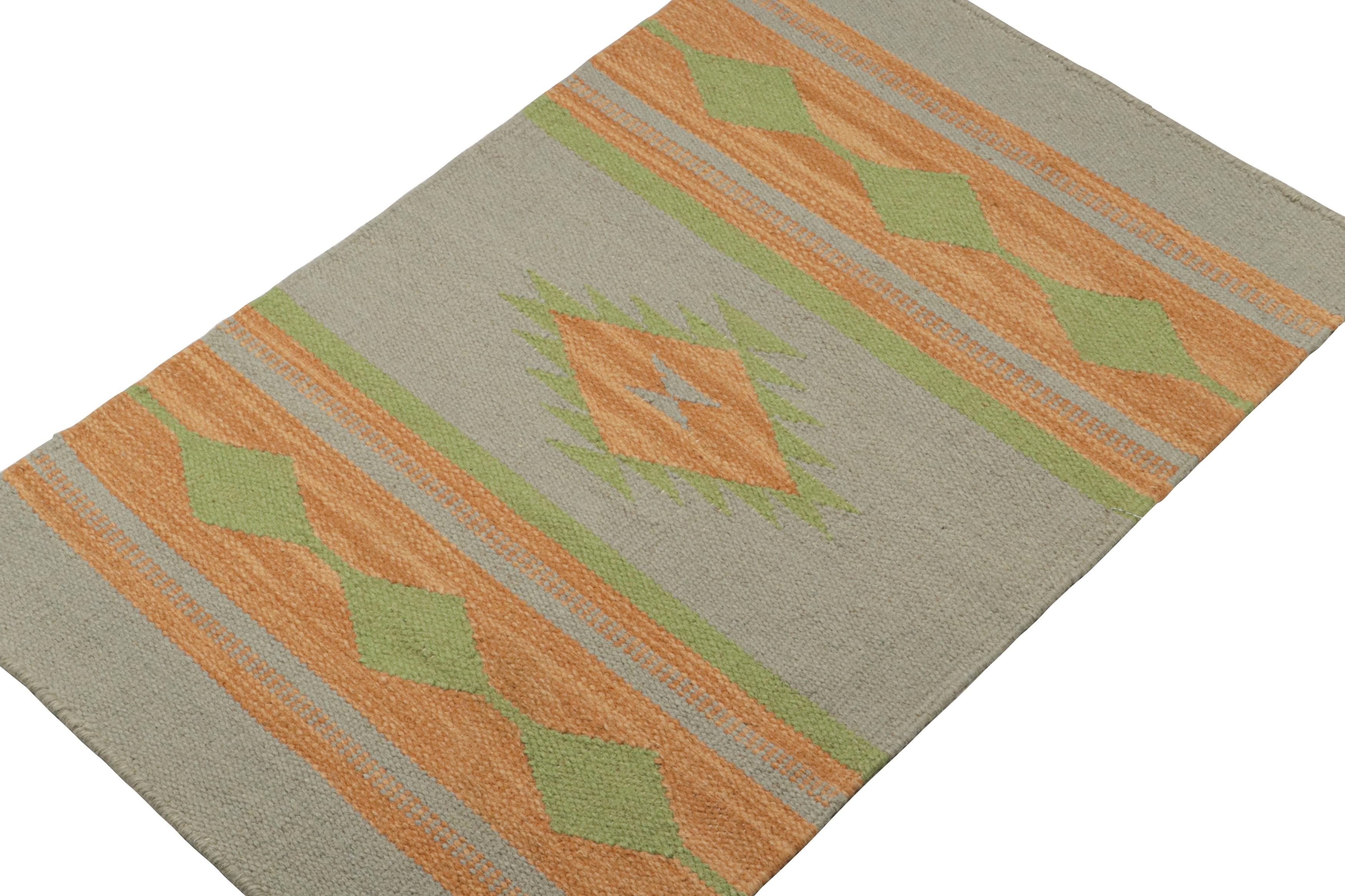 Inspired by tribal kilims, this 2x3 piece is an elegant new addition to the flatweave collection by Rug & Kilim.  

On the Design: 

Handwoven in wool, this contemporary kilim carries gold & green geometric patterns on grey. Further enjoying a smart