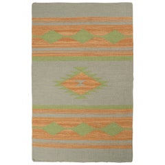 Rug
Kilim: Kilim in stile tribale in grigio con motivi in oro
verde